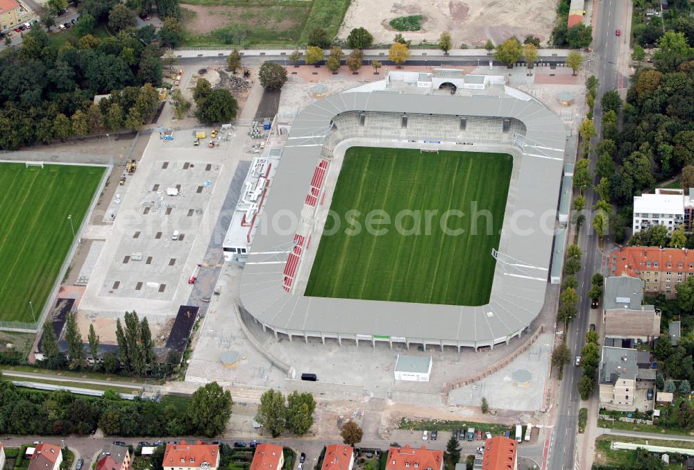 Aerial photograph Halle / Saale - Umbau des Erdgas Sportpark in Halle / Saale (vorher Kurt-Wabbel-Stadion). Das neue Stadion ist mit einer Flutlichtanlage ausgestattet und hat außer den Zuschauerplätzen, VIP-Logen und einen Business Bereich. The Erdgas Sportpark in Halle / Saale was refurbished. The new stadium has floodlights, VIP-lodges and a business area.