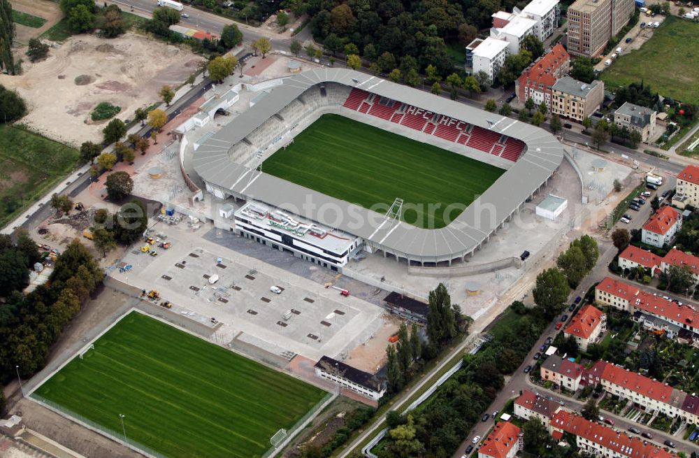 Halle / Saale from the bird's eye view: Umbau des Erdgas Sportpark in Halle / Saale (vorher Kurt-Wabbel-Stadion). Das neue Stadion ist mit einer Flutlichtanlage ausgestattet und hat außer den Zuschauerplätzen, VIP-Logen und einen Business Bereich. The Erdgas Sportpark in Halle / Saale was refurbished. The new stadium has floodlights, VIP-lodges and a business area.