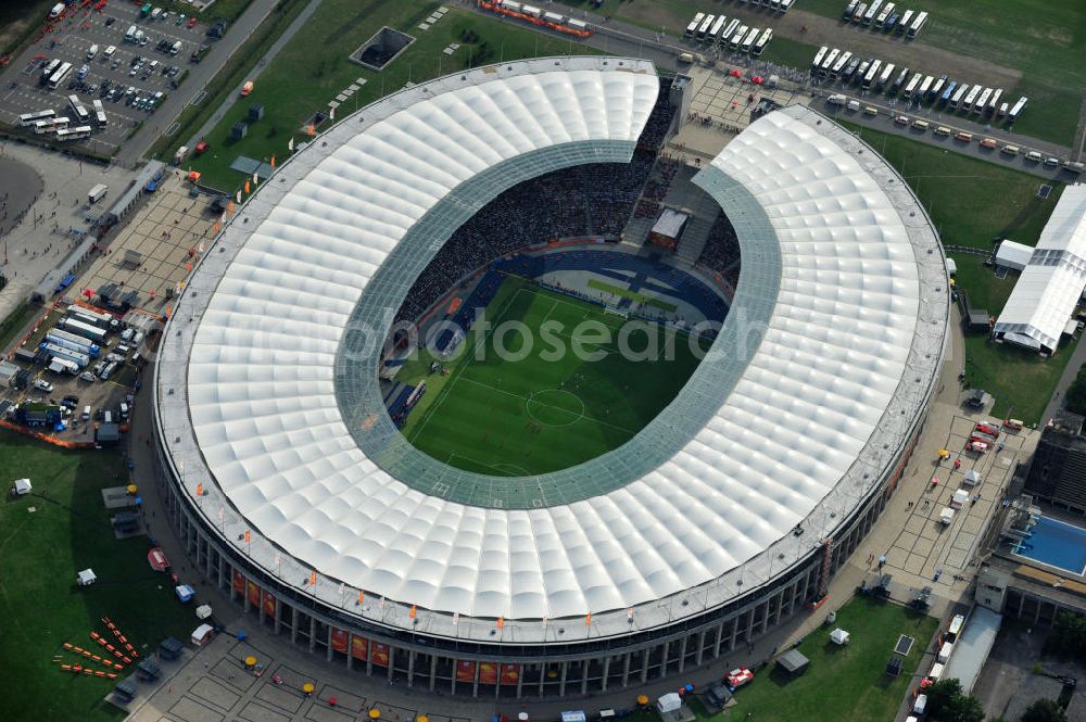 Aerial image Berlin - Blick auf das Eröffnungsspiel der Fußball-Weltmeisterschaft der Frauen 2011 im Berliner Olympiastadion. Die deutsche Nationalmannschaft der Frauen trifft auf die Mannschaft Kanadas, Die 6. Fußball-Weltmeisterschaft der Frauen (offiziell: FIFA Women’s World Cup Germany 2011 / „ FIFA Frauen-Weltmeisterschaft Deutschland 2011 “) wird vom 26. Juni bis 17. Juli 2011 im Land des Titelverteidigers Deutschland ausgetragen. Opening match of the FIFA Women's World Cup 2011 in Berlin's Olympic Stadium.