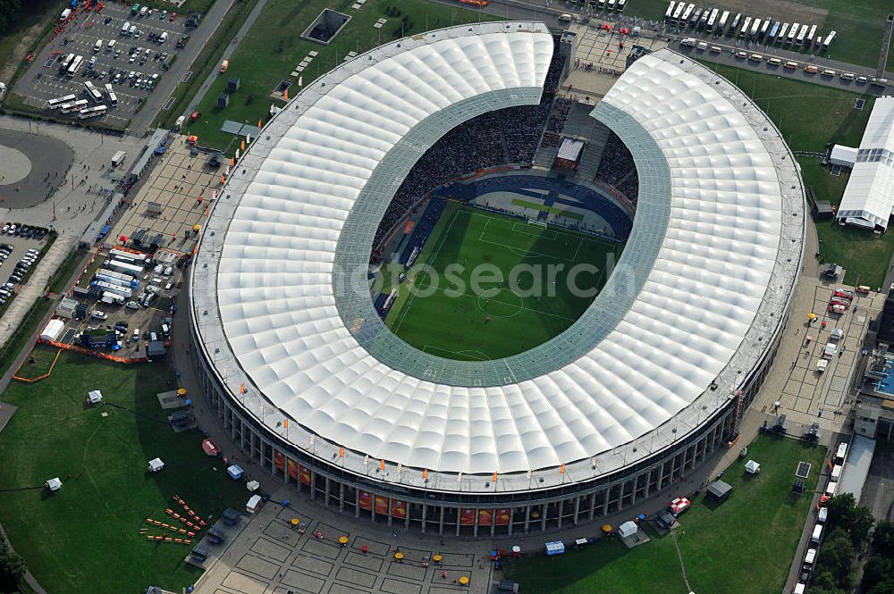 Aerial image Berlin - Blick auf das Eröffnungsspiel der Fußball-Weltmeisterschaft der Frauen 2011 im Berliner Olympiastadion. Die deutsche Nationalmannschaft der Frauen trifft auf die Mannschaft Kanadas, Die 6. Fußball-Weltmeisterschaft der Frauen (offiziell: FIFA Women’s World Cup Germany 2011 / „ FIFA Frauen-Weltmeisterschaft Deutschland 2011 “) wird vom 26. Juni bis 17. Juli 2011 im Land des Titelverteidigers Deutschland ausgetragen. Opening match of the FIFA Women's World Cup 2011 in Berlin's Olympic Stadium.