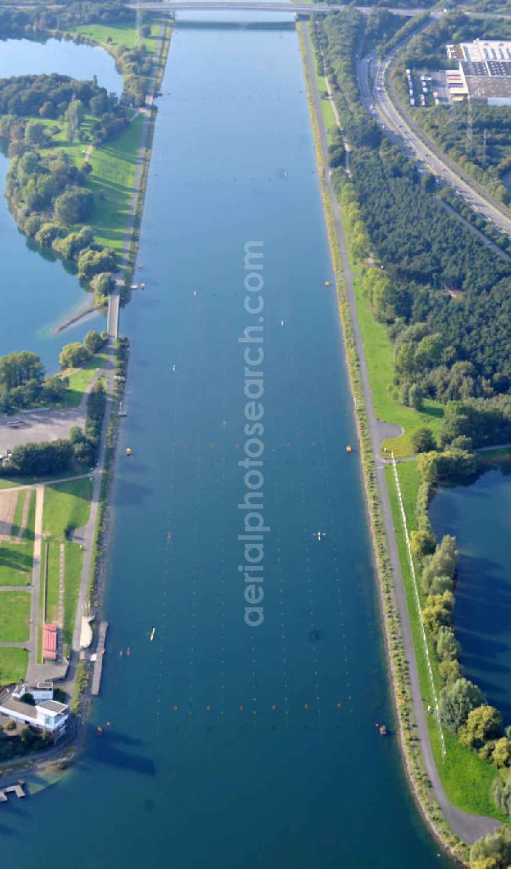 Köln from the bird's eye view: Die Regattabahn in der Sport- und Erholungsanlage Fühlinger See an der Industriestraße, der Neusser Landstraße, der Merianstraße und der Oranjehofstraße in Köln-Fühlingen in Nordrhein-Westfalen. The regatta course in the sports ground and recreation park of the lake Fühlinger See at the streets Industriestrasse, der Neusser Landstrasse, der Merianstrasse und der Oranjehofstrasse in Cologne in North Rhine-Westphalia.