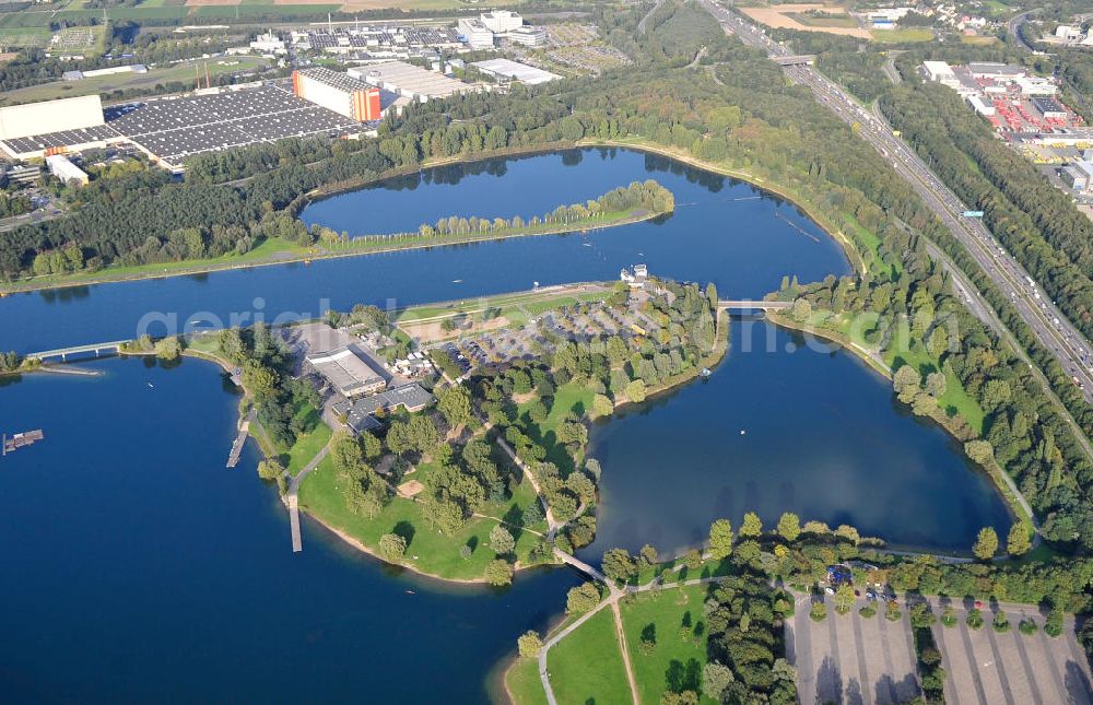 Köln from the bird's eye view: Die Regattabahn in der Sport- und Erholungsanlage Fühlinger See an der Industriestraße, der Neusser Landstraße, der Merianstraße und der Oranjehofstraße in Köln-Fühlingen in Nordrhein-Westfalen. The regatta course in the sports ground and recreation park of the lake Fühlinger See at the streets Industriestrasse, der Neusser Landstrasse, der Merianstrasse und der Oranjehofstrasse in Cologne in North Rhine-Westphalia.