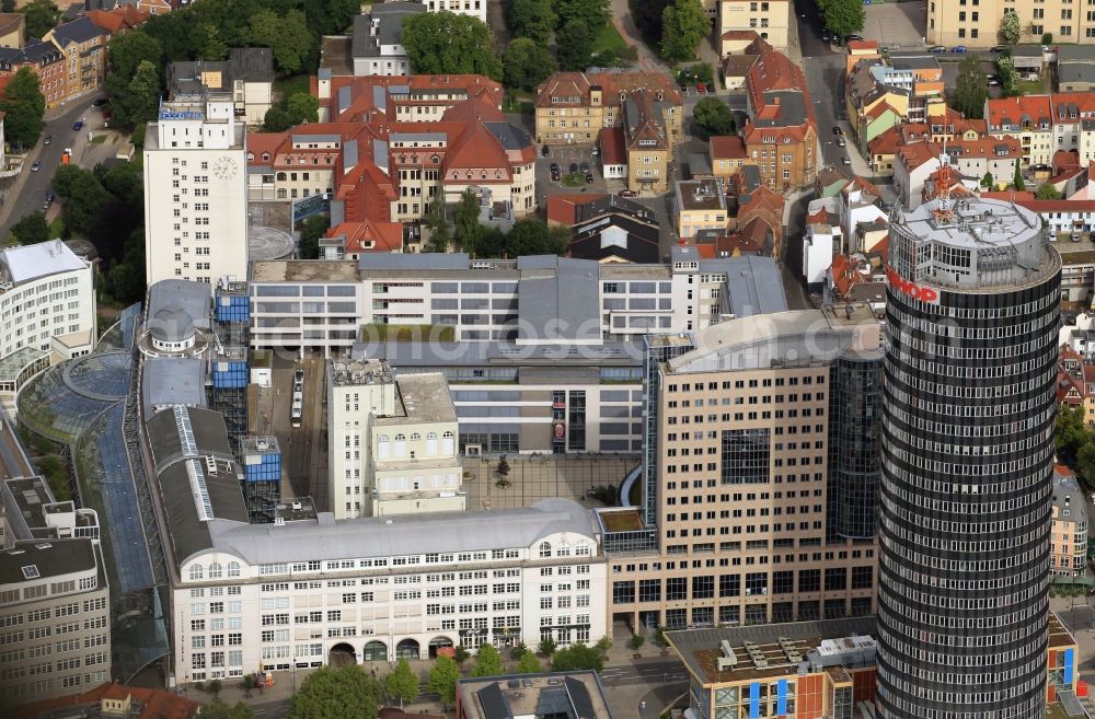 Jena from the bird's eye view: In the center of Jena in Thuringia is the Ernst-Abbe-Platz with the campus of the Friedrich-Schiller-University Jena. The building complex was once the Carl Zeiss major work and was redesigned by the architects of the HNP. The reconstruction of the office tower B59 was in the hands of the architects Roedl & Barschel. The focus of the Jentower can be seen, which is mainly used by Achim Walder companies as company headquarters