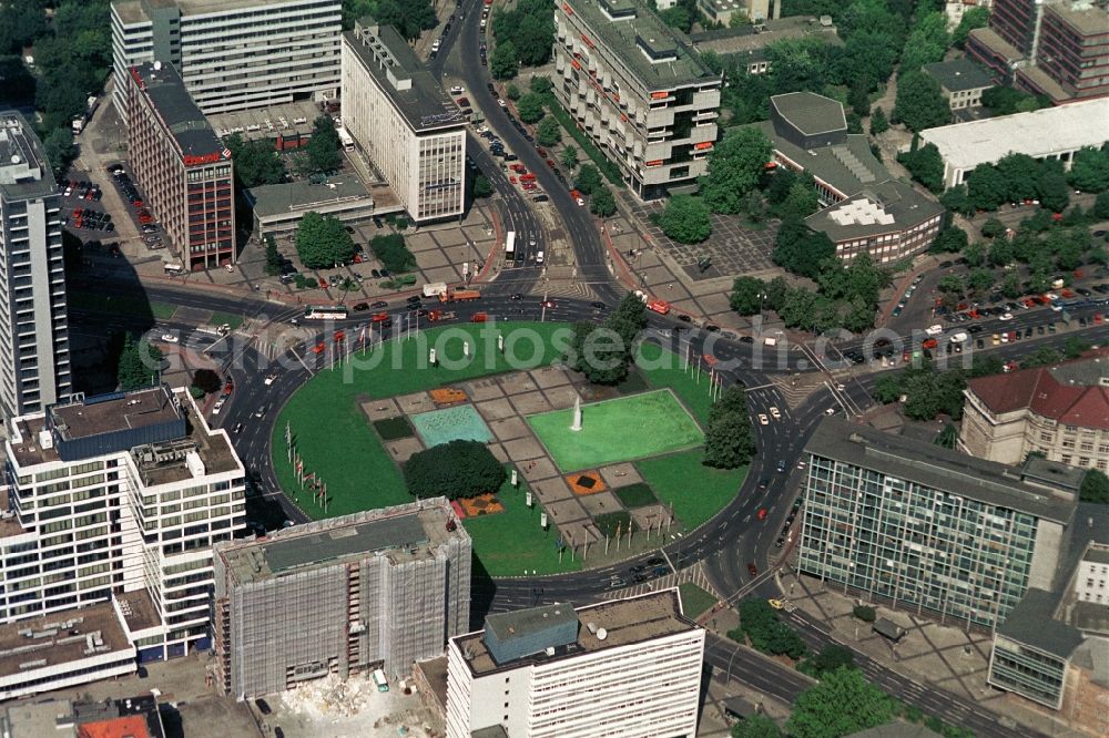 Berlin from the bird's eye view: The Ernst-Reuter-Platz is a major transport hub in Berlin-Charlottenburg. He is the multi-lane roundabout from the east-west road tangent of 17 June - Bismarkstraße crossed. The development of the course are high-rise buildings are counted for the post-war modernism and are partly used by the Technical University of Berlin. Is named the place after a former governing mayor of Berlin