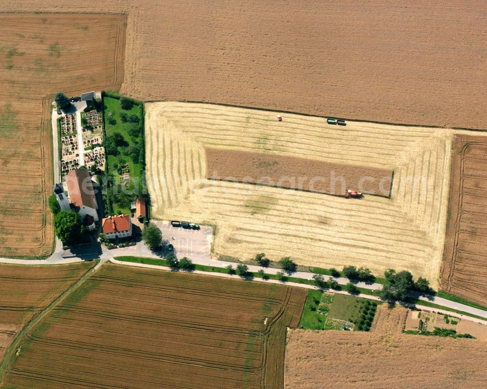 Aerial photograph Höchstberg - Harvest use of heavy agricultural machinery - combine harvesters and harvesting vehicles on agricultural fields in Hoechstberg in the state Baden-Wuerttemberg, Germany