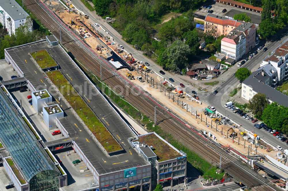 Berlin from the bird's eye view: Construction site for the assembly of the replacement railway bridge structure for the routing of the railway tracks at the train station on place Elcknerplatz - Bahnhofstrasse - Am Bahndamm in the district Koepenick in Berlin, Germany