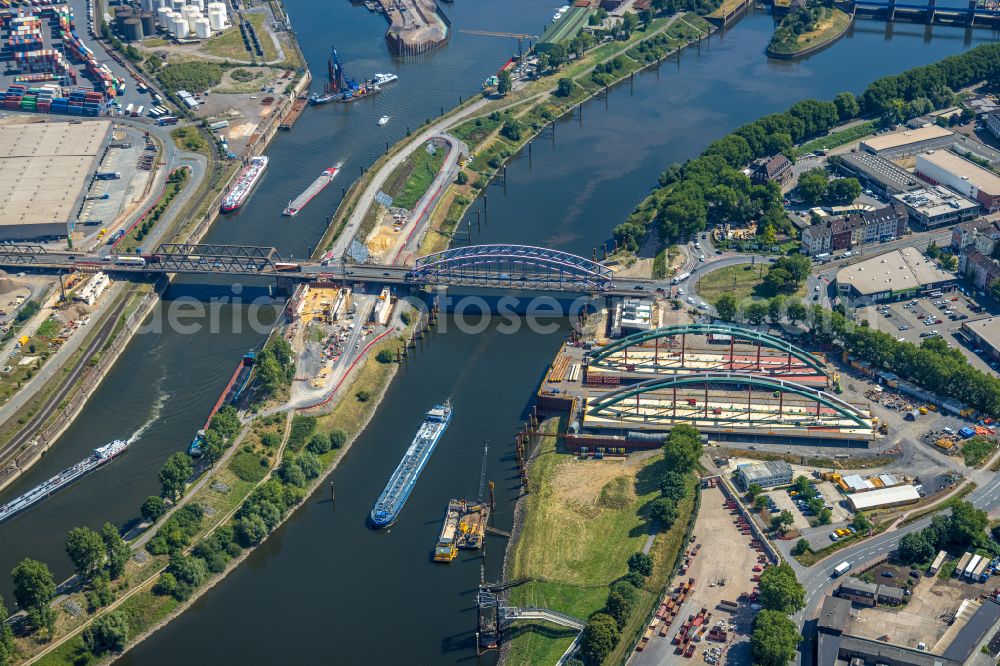 Duisburg from the bird's eye view: Construction site for a new replacement building for the renovation, renewal and repair of the bridge structure Karl-Lehr-Bruecke about the Ruhr on street Ruhrorter Strasse in the district Ruhrort in Duisburg at Ruhrgebiet in the state North Rhine-Westphalia, Germany