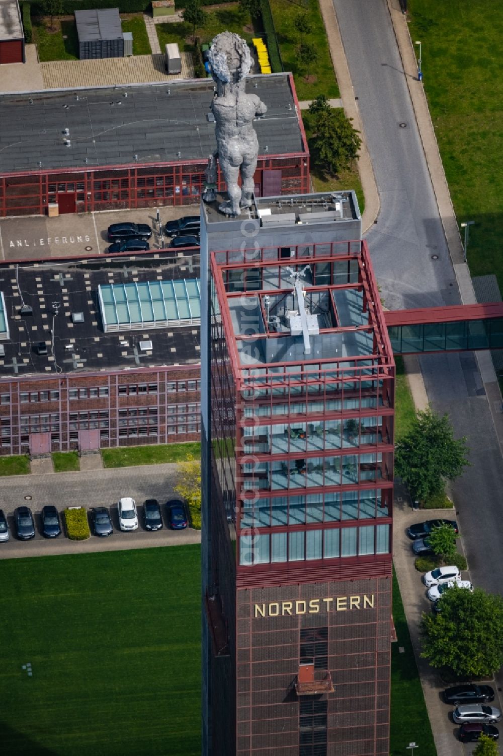 Gelsenkirchen from the bird's eye view: Development tower on the Nordsternturm office building of the administration and commercial building of Vivawest Wohnen GmbH at Bugapark in the Horst district of Gelsenkirchen in the Ruhr area in the state of North Rhine-Westphalia