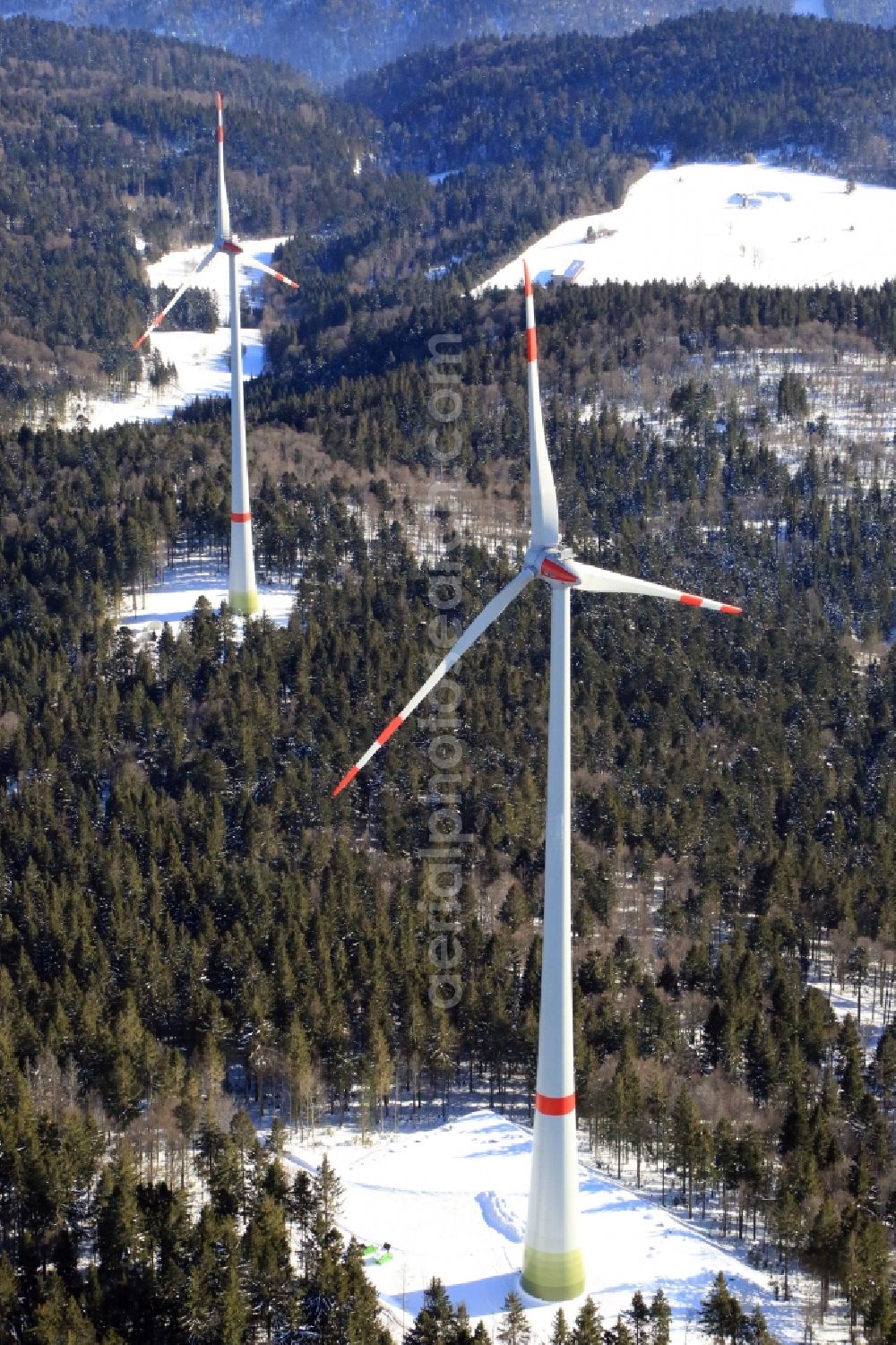 Schopfheim from above - On the snow covered Rohrenkopf, the local mountain of Gersbach, a district of Schopfheim in Baden-Wuerttemberg, wind turbines have started operation. It is the first wind farm in the south of the Black Forest