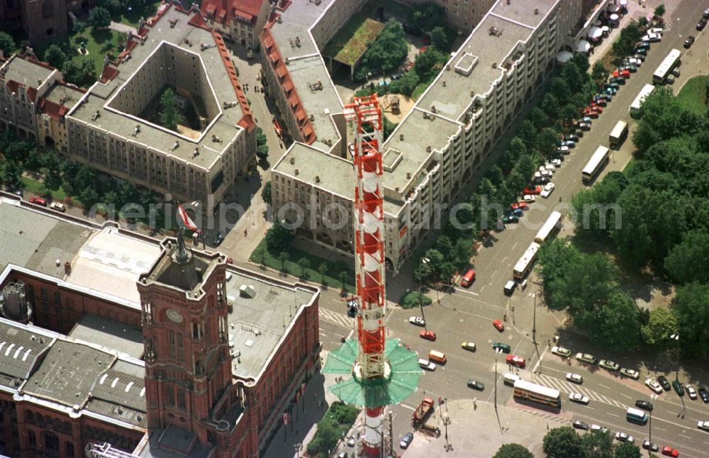 Aerial image Berlin - Extension construction site to raise the steel mast antenna support above the shiny silver sphere of the telecommunications tower building and television tower in Mitte in Berlin, Germany