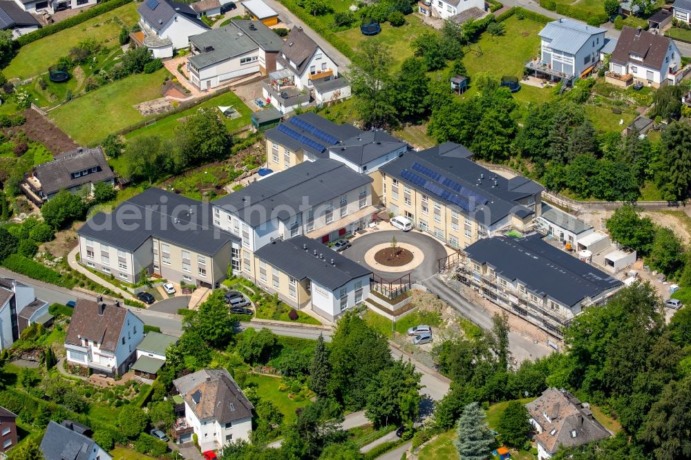 Aerial photograph Meschede - Expansion construction site at the building complex of the Senior Centre Focus Meschede on Noerdeltstrasse in Meschede in North Rhine-Westphalia, Germany