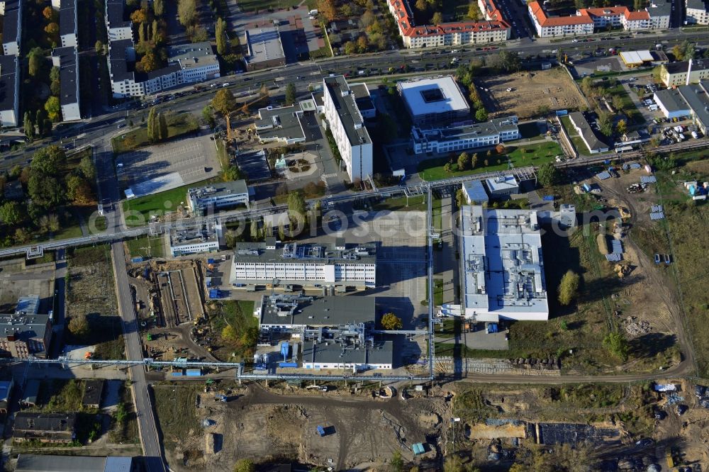 Aerial image Berlin - Expansion construction site on the grounds of the Berlin Chemie AG in Adlershof. The Berlin-based pharmaceutical company is part of the pharmaceutical company Menarini