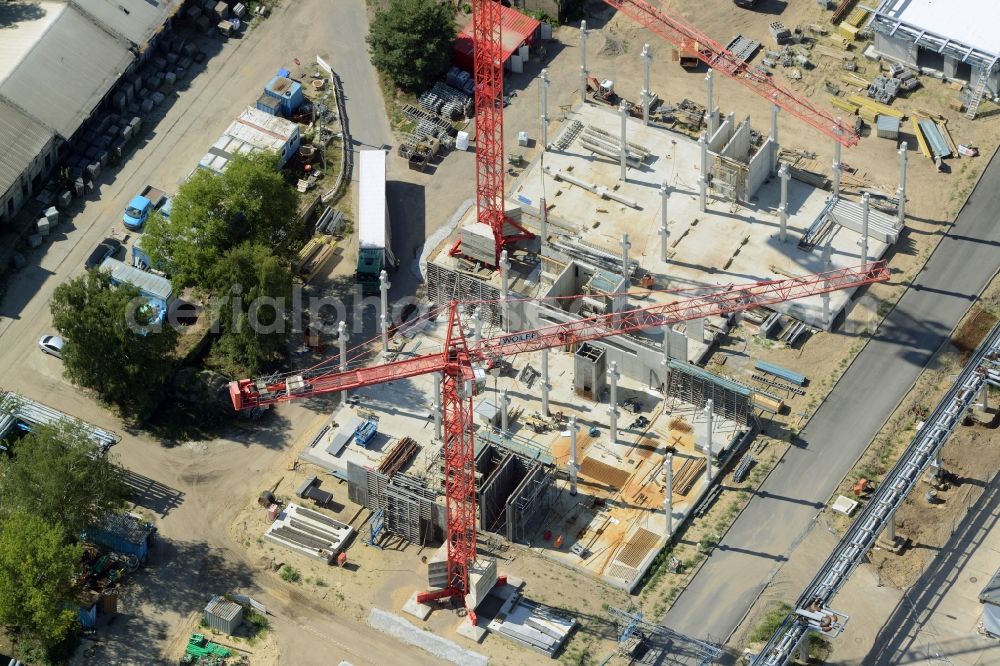 Aerial image Berlin - Expansion construction site on the grounds of the Berlin Chemie AG in Adlershof. The Berlin-based pharmaceutical company is part of the pharmaceutical company Menarini