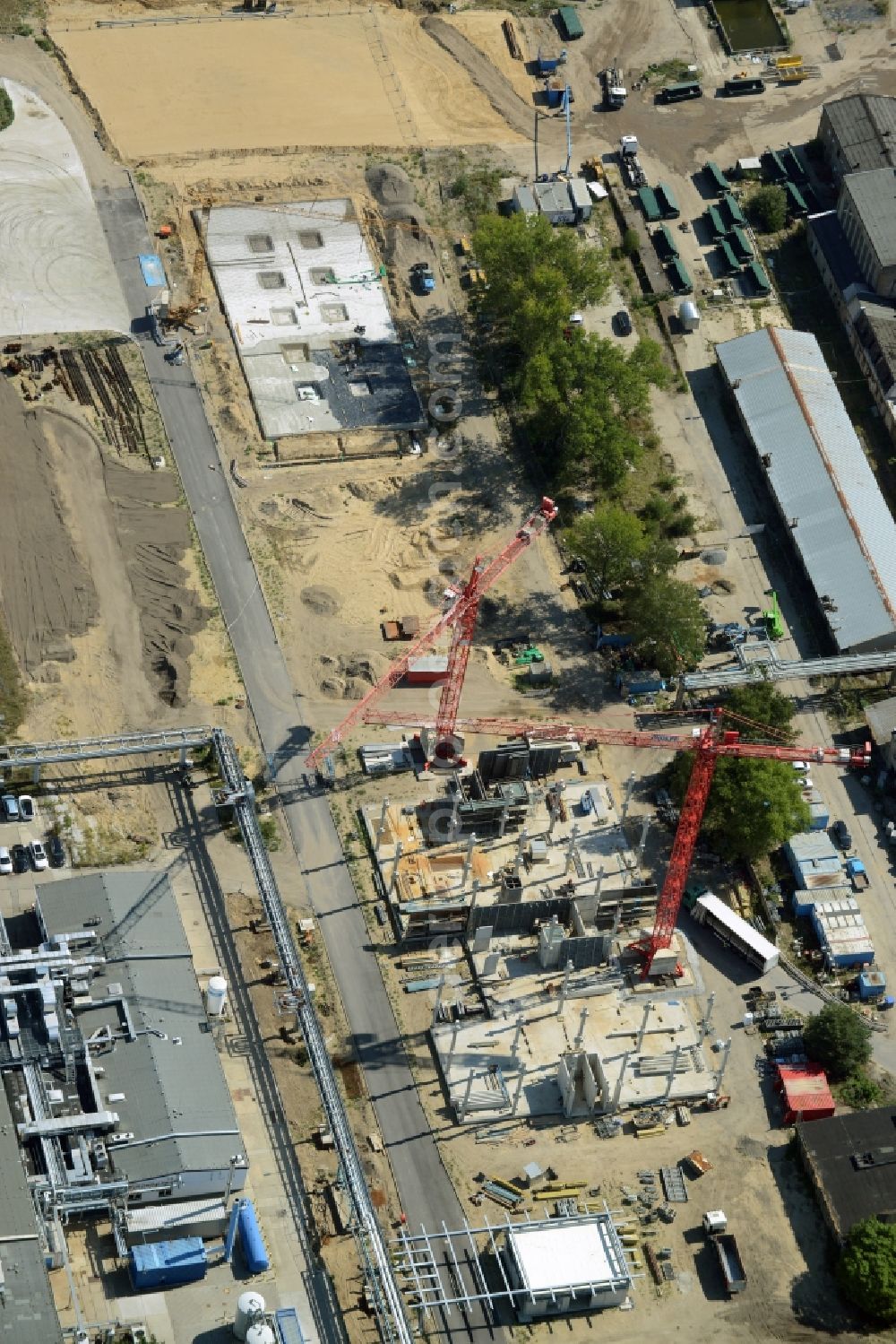 Berlin from the bird's eye view: Expansion construction site on the grounds of the Berlin Chemie AG in Adlershof. The Berlin-based pharmaceutical company is part of the pharmaceutical company Menarini