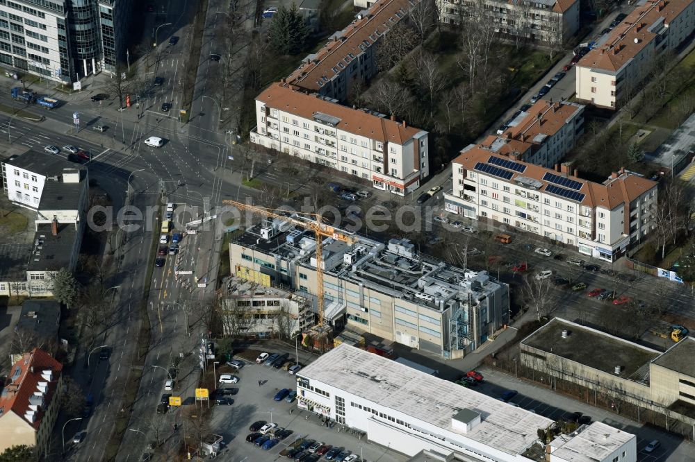 Aerial image Berlin - Expansion construction site on the grounds of the Berlin Chemie AG in Neukoelln. The Berlin-based pharmaceutical company is part of the pharmaceutical company Menarini