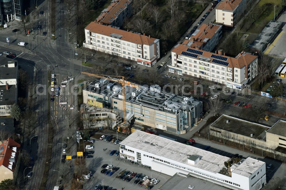 Berlin from above - Expansion construction site on the grounds of the Berlin Chemie AG in Neukoelln. The Berlin-based pharmaceutical company is part of the pharmaceutical company Menarini