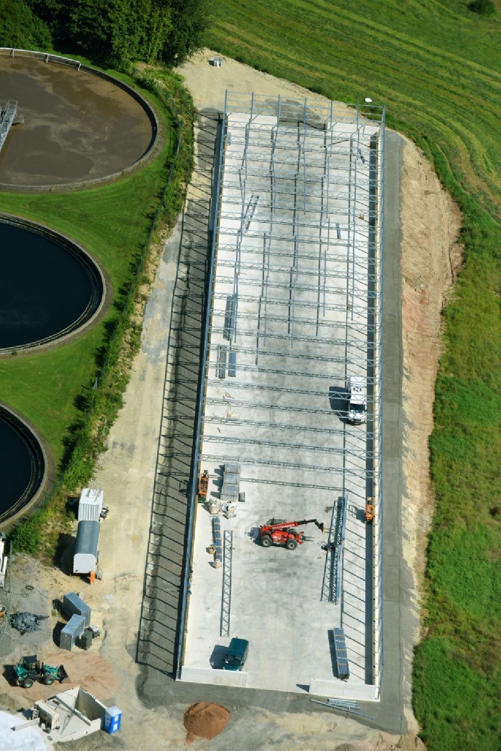 Aerial image Warburg - New construction site and extension of the sewage treatment basins and purification stages in of Warburger Klaeranlage on Kuhlemuehler Weg in Warburg in the state North Rhine-Westphalia, Germany