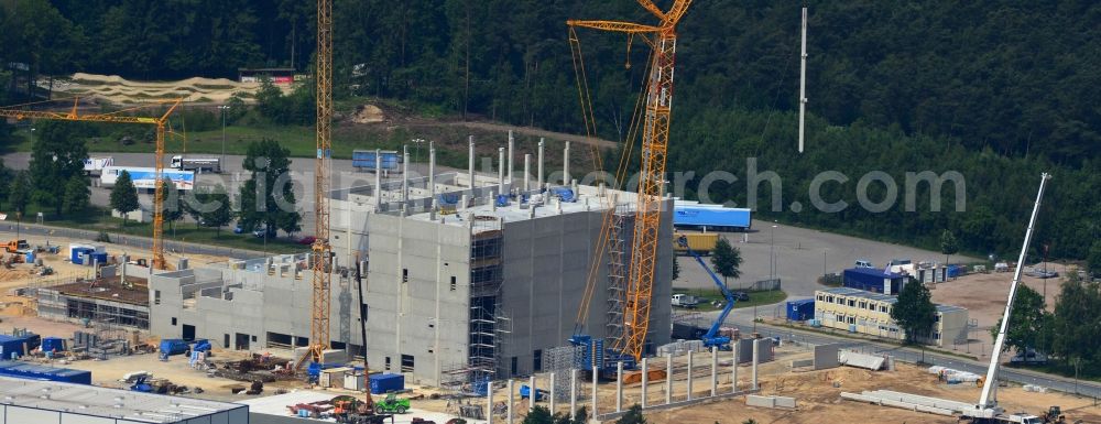 Aerial photograph Zeven - Expansion construction site to build a new high-bay warehouse and cold store of the DMK Deutsches Milch Kontor GmbH in Zeven in Lower Saxony