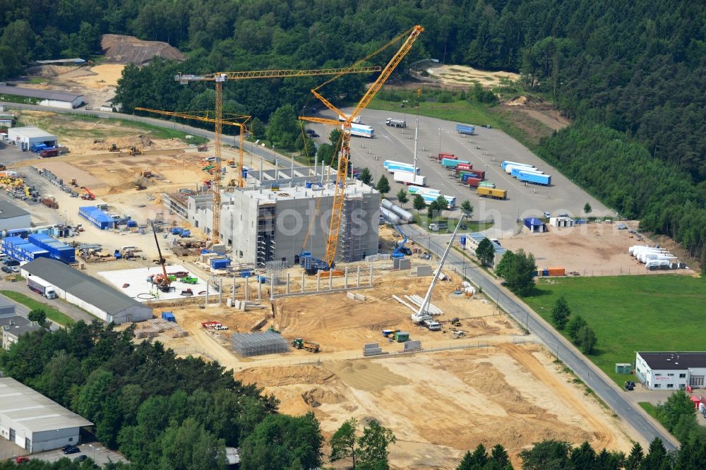 Zeven from the bird's eye view: Expansion construction site to build a new high-bay warehouse and cold store of the DMK Deutsches Milch Kontor GmbH in Zeven in Lower Saxony