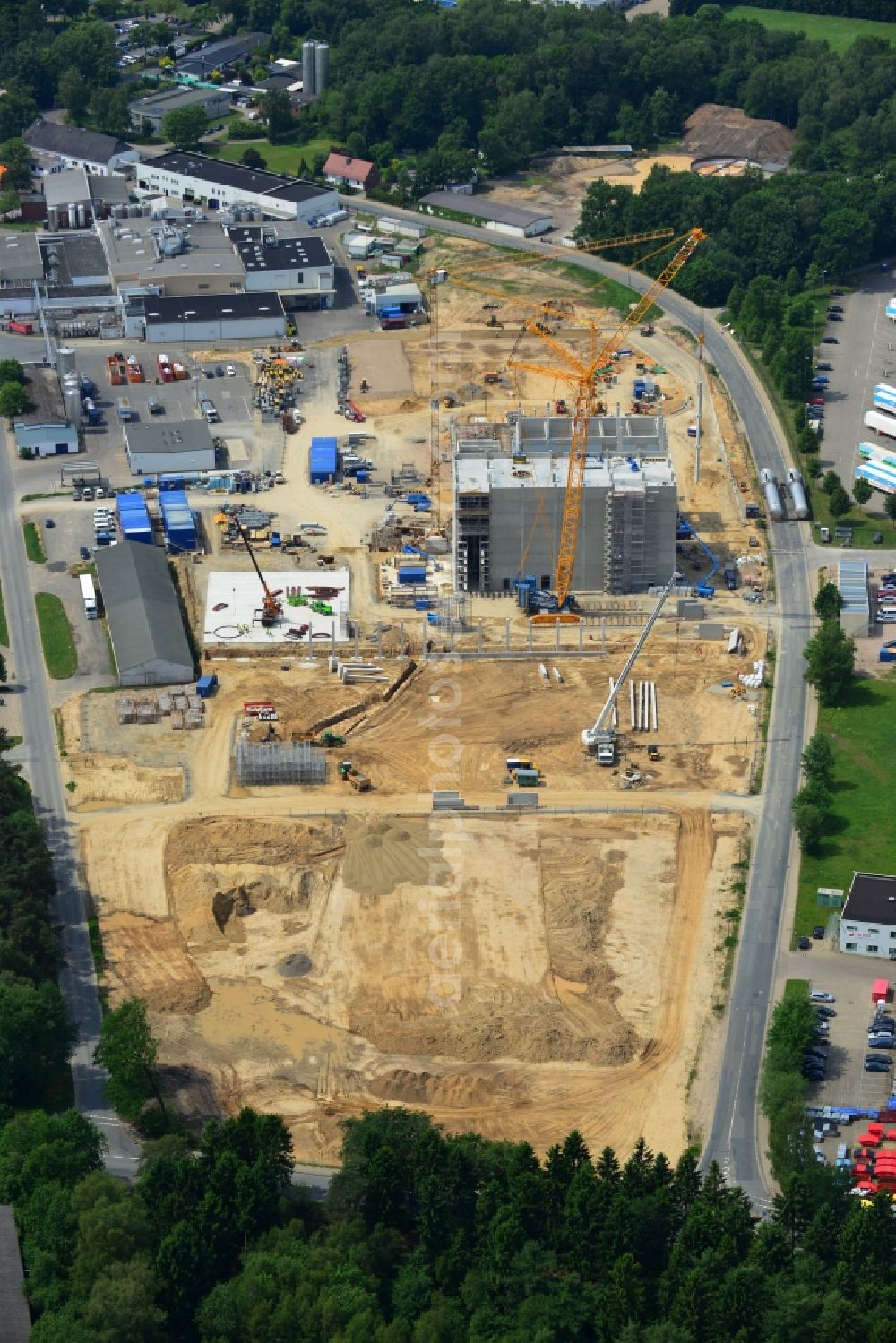 Zeven from the bird's eye view: Expansion construction site to build a new high-bay warehouse and cold store of the DMK Deutsches Milch Kontor GmbH in Zeven in Lower Saxony