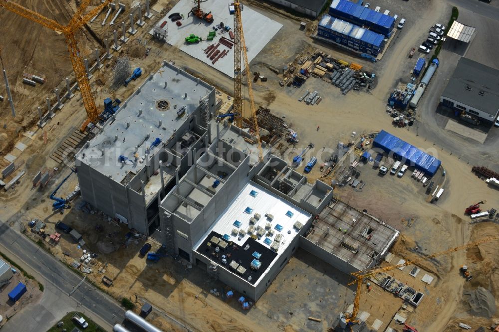 Aerial photograph Zeven - Expansion construction site to build a new high-bay warehouse and cold store of the DMK Deutsches Milch Kontor GmbH in Zeven in Lower Saxony