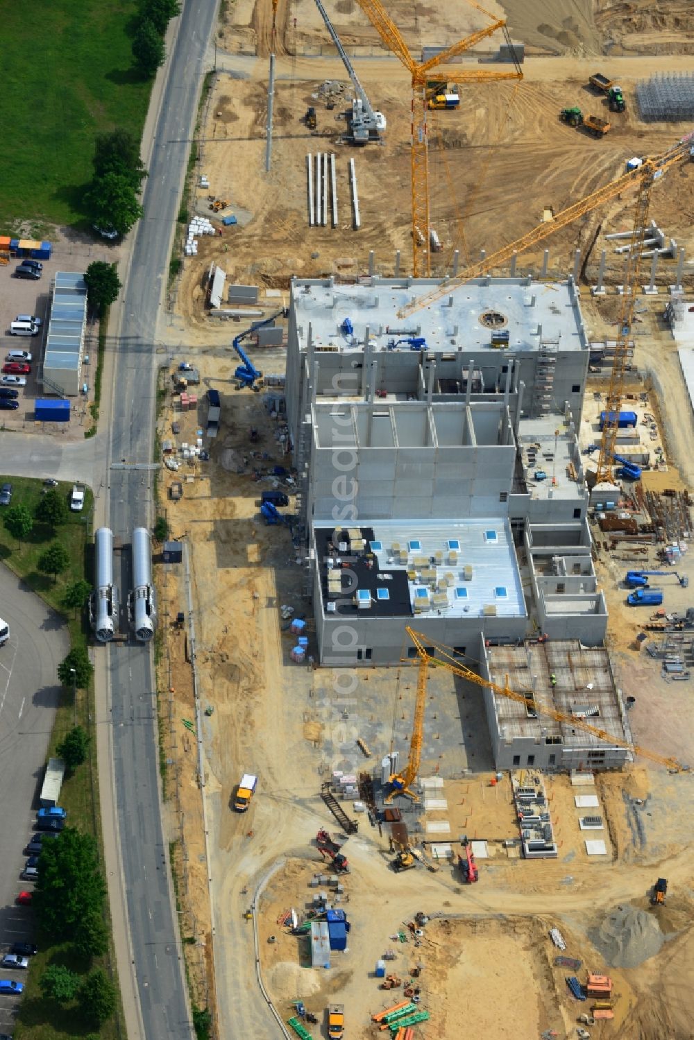 Zeven from the bird's eye view: Expansion construction site to build a new high-bay warehouse and cold store of the DMK Deutsches Milch Kontor GmbH in Zeven in Lower Saxony