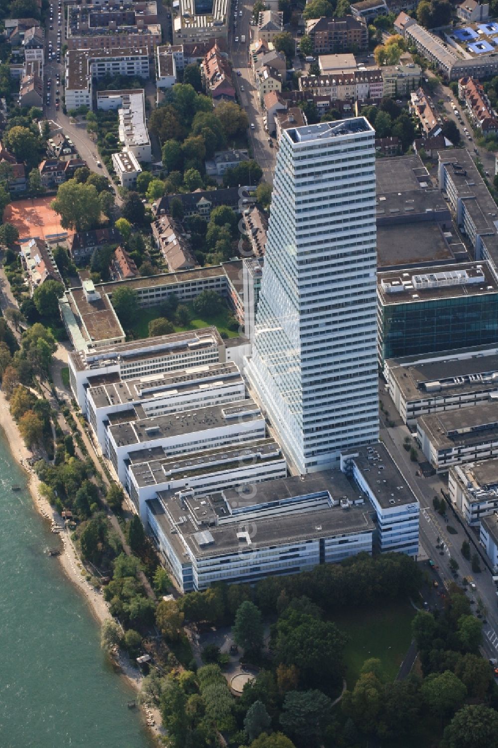 Aerial image Basel - Extension construction sites on the premises and premises of the pharmaceutical company Roche with the cityscape-defining high-rise in Basel in Switzerland