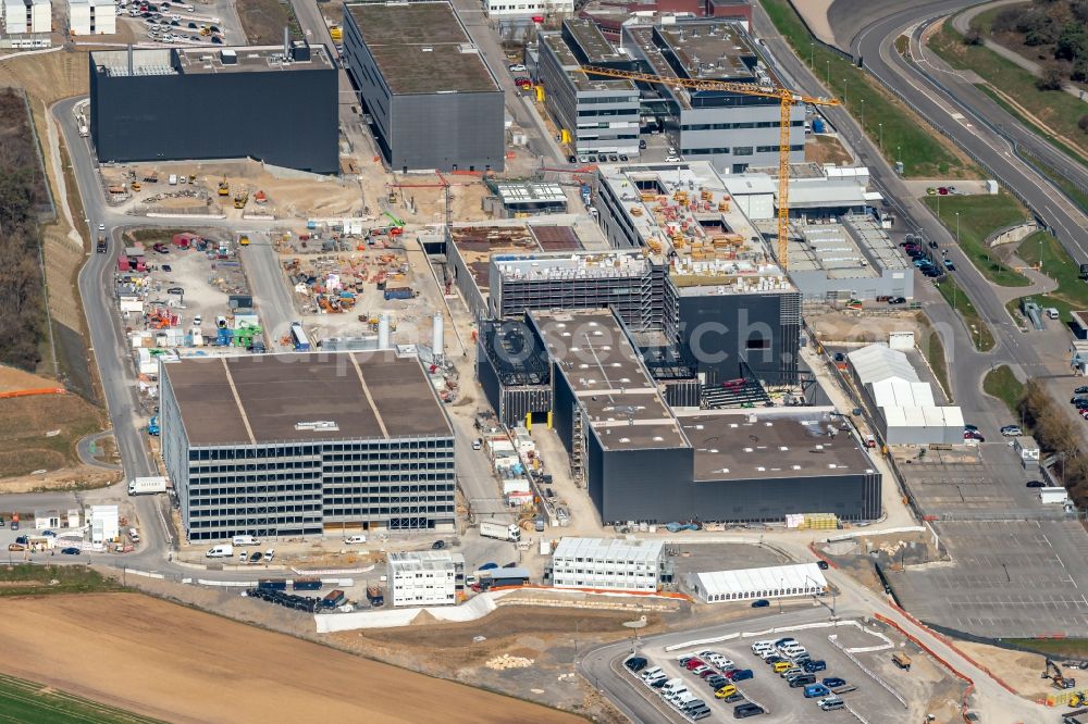 Weissach from the bird's eye view: Extension - new building - construction site on the factory premises of Porsche Deutschland GmbH in Weissach in the state Baden-Wurttemberg, Germany