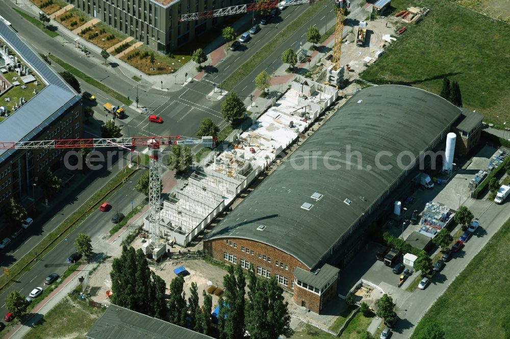 Berlin from above - New extension building site on the buildings and production halls on the premises of the Air Liquide Sales Partners Research and Technology Service Schroeder - Technical Gases in the Adlershof district in Berlin, Germany