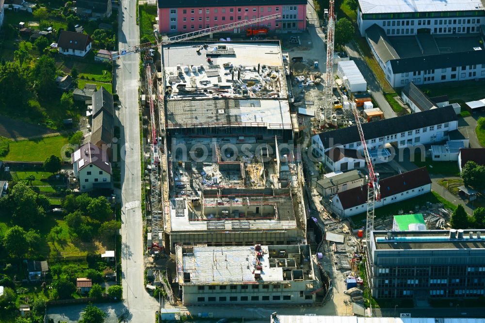 Jena from the bird's eye view: Extension of new building site at the building complex of the institute Friedrich-Loeffler-Institut Bundesforschungsinstitut fuer Tiergesundheit on street Naumburger Strasse - Flurweg in Jena in the state Thuringia, Germany