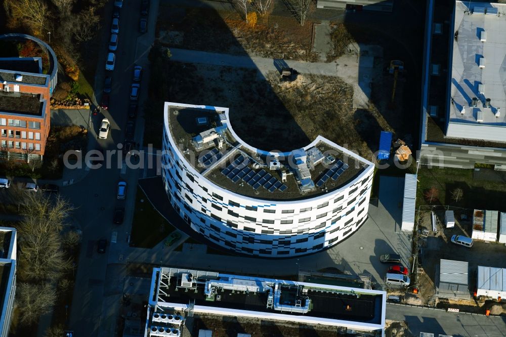 Berlin from the bird's eye view: Extension of new building site at the building complex of the institute Willy-Wien-Laboratorium (PTB) on Magnusstrasse in the district Adlershof in Berlin, Germany