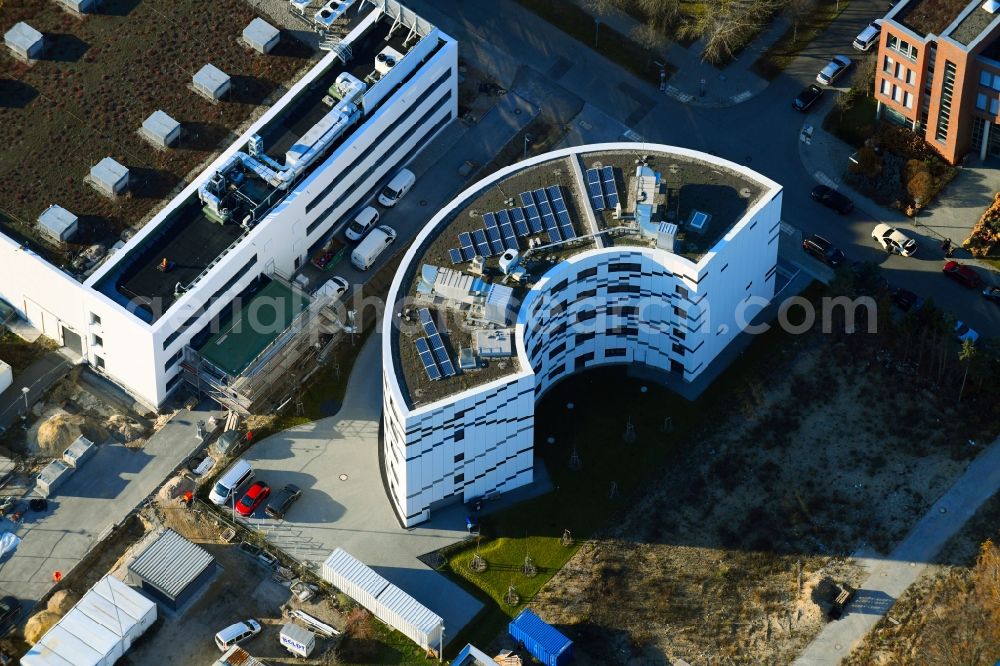 Aerial image Berlin - Extension of new building site at the building complex of the institute Willy-Wien-Laboratorium (PTB) on Magnusstrasse in the district Adlershof in Berlin, Germany