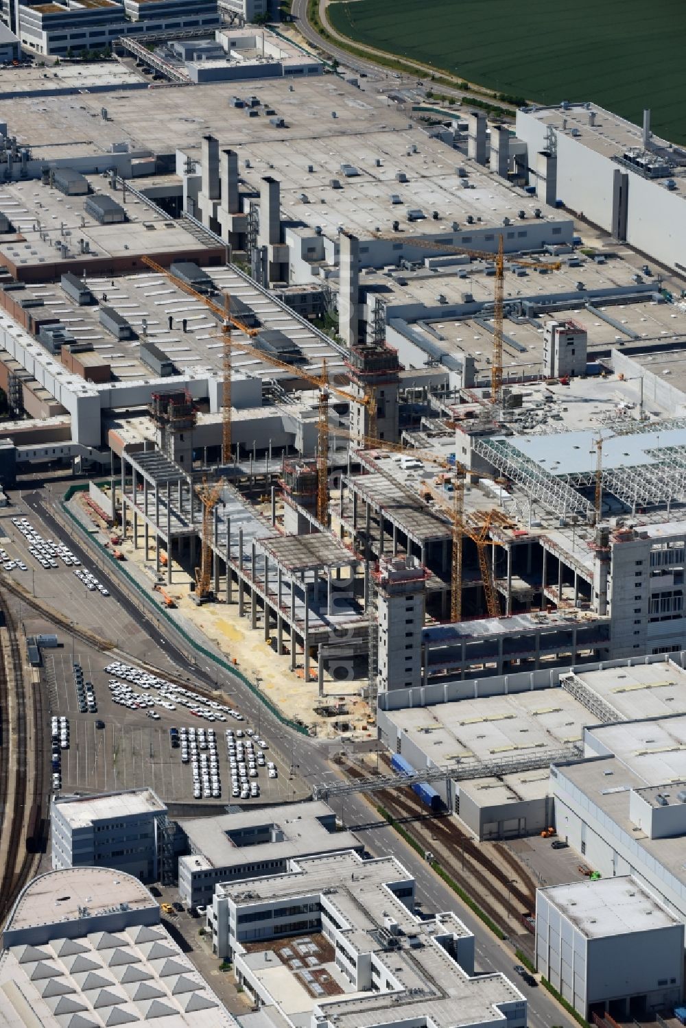 Ingolstadt from the bird's eye view: Extension - new building - construction site on the factory premises of AUDI AG in Ingolstadt in the state Bavaria, Germany