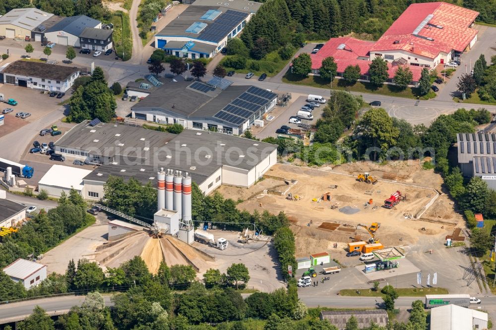 Schmallenberg from above - Extension - new building - construction site on the factory premises AUFT Produktions- and Vertriebs GmbH in Schmallenberg in the state North Rhine-Westphalia, Germany