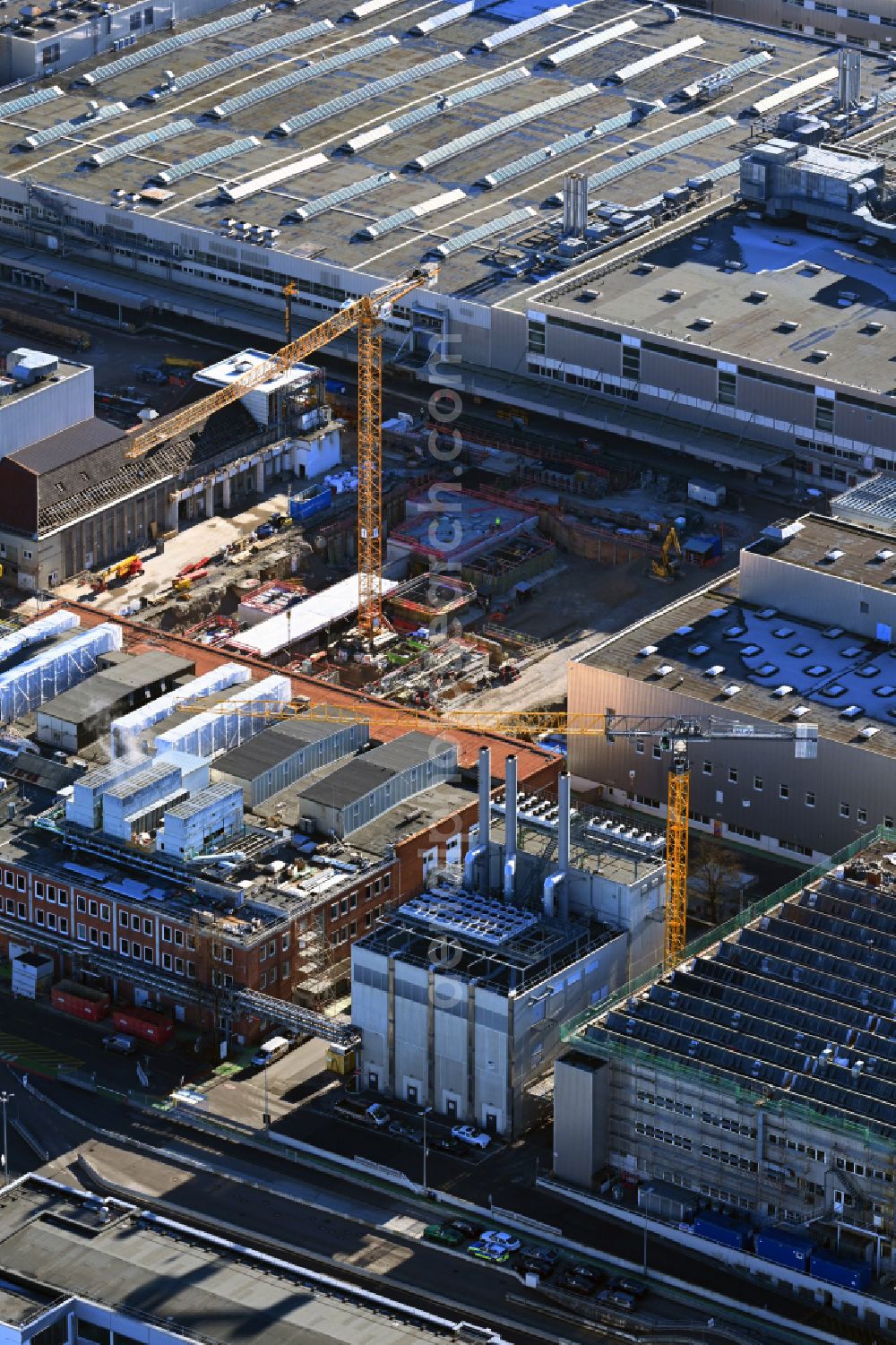 München from above - Expansion - new construction - construction site on the buildings and production halls of the factory premises at the combined heat and power plant of the BMW factory on Hochregalstrasse in the district of Milbertshofen in Munich in the state Bavaria, Germany