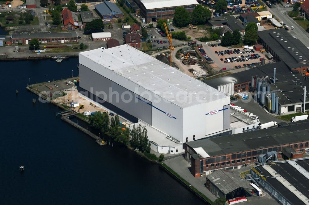 Aerial image Lübeck - Extension - new building - construction site on the factory premises of H. & J. BRUeGGEN KG on Glashuettenweg in Luebeck in the state Schleswig-Holstein, Germany