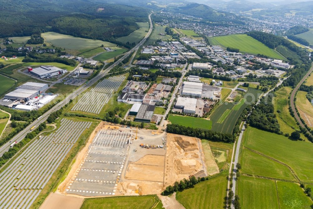 Aerial photograph Meschede - Extension - new building - construction site on the factory premises of Briloner Leuchten GmbH & Co. KG in the district Enste in Meschede in the state North Rhine-Westphalia, Germany