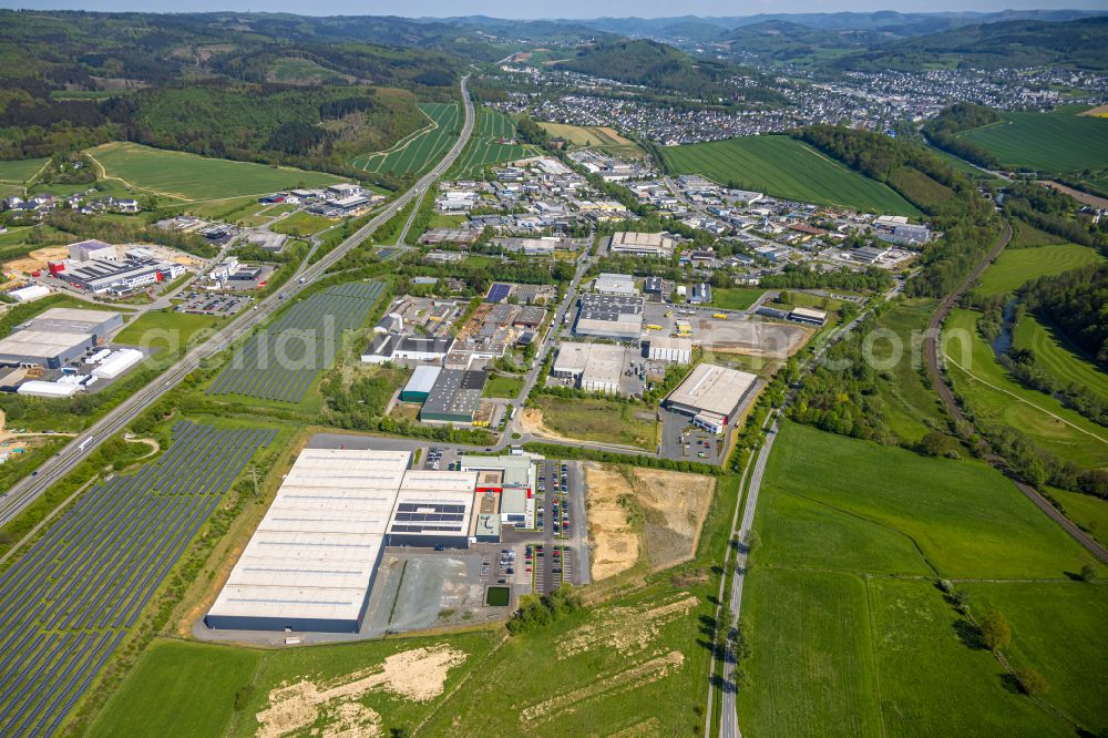 Aerial photograph Meschede - Extension - new building - construction site on the factory premises of Briloner Leuchten GmbH & Co. KG in the district Enste in Meschede in the state North Rhine-Westphalia, Germany