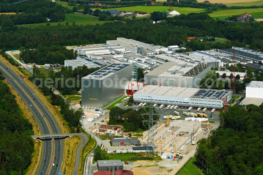 Halle (Westfalen) from the bird's eye view: Extension - new building - construction site on the factory premises Condetta GmbH & Co. KG Storck Industrie-Service in Halle (Westfalen) in the state North Rhine-Westphalia, Germany