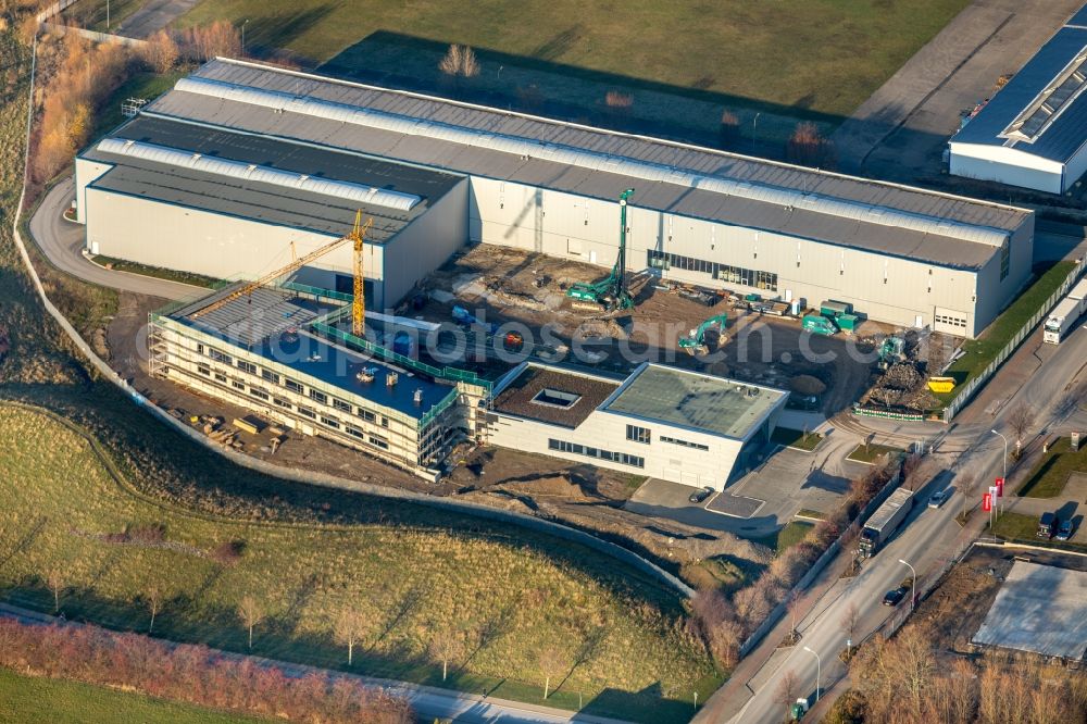 Aerial photograph Werl - Extension - new building - construction site on the factory premises of Flachstahl Werl GmbH & Co KG on Langenwiedenweg in Werl in the state North Rhine-Westphalia, Germany