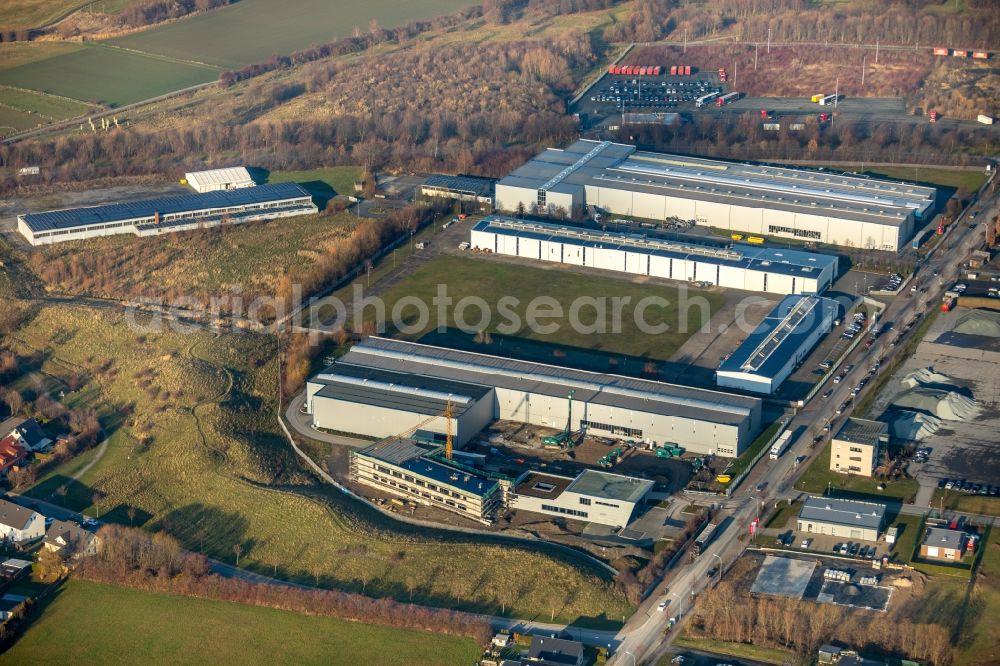 Werl from the bird's eye view: Extension - new building - construction site on the factory premises of Hansa Automotive GmbH on Langenwiedenweg in Werl in the state North Rhine-Westphalia, Germany