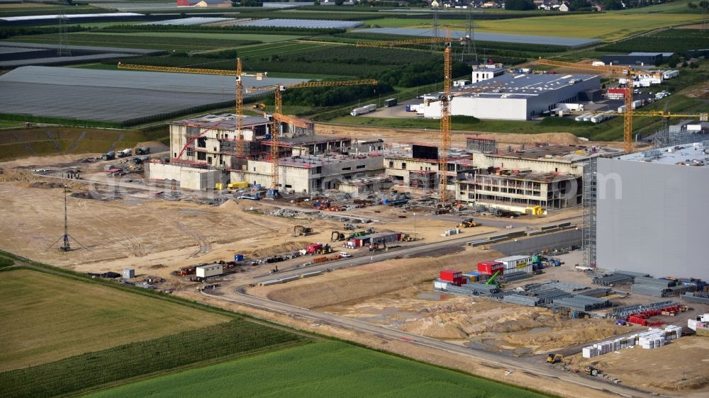 Grafschaft from the bird's eye view: Extension - new building - construction site on the factory premises of Haribo GmbH in Grafschaft in the state Rhineland-Palatinate, Germany