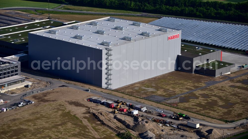 Grafschaft from the bird's eye view: Extension - new building - construction site on the factory premises of Haribo GmbH in Grafschaft in the state Rhineland-Palatinate, Germany