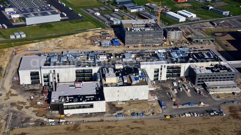 Grafschaft from the bird's eye view: Extension - new building - construction site on the factory premises of Haribo GmbH in Grafschaft in the state Rhineland-Palatinate, Germany