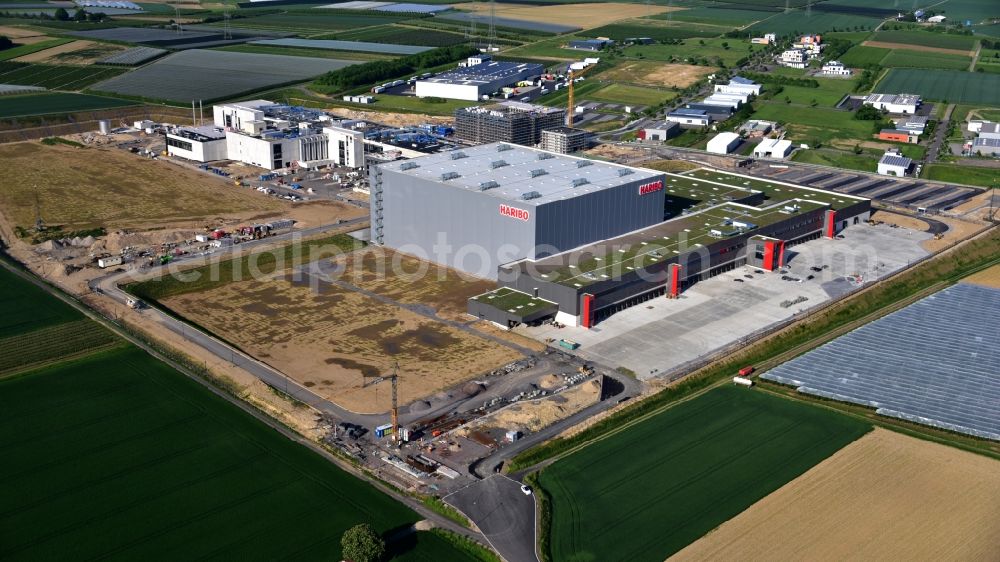 Aerial photograph Grafschaft - Extension - new building - construction site on the factory premises of Haribo GmbH in Grafschaft in the state Rhineland-Palatinate, Germany