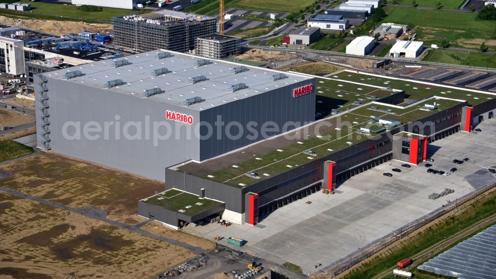 Grafschaft from above - Extension - new building - construction site on the factory premises of Haribo GmbH in Grafschaft in the state Rhineland-Palatinate, Germany