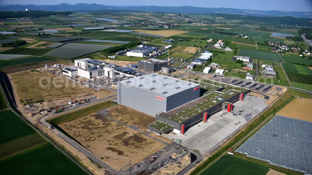 Grafschaft from the bird's eye view: Extension - new building - construction site on the factory premises of Haribo GmbH in Grafschaft in the state Rhineland-Palatinate, Germany