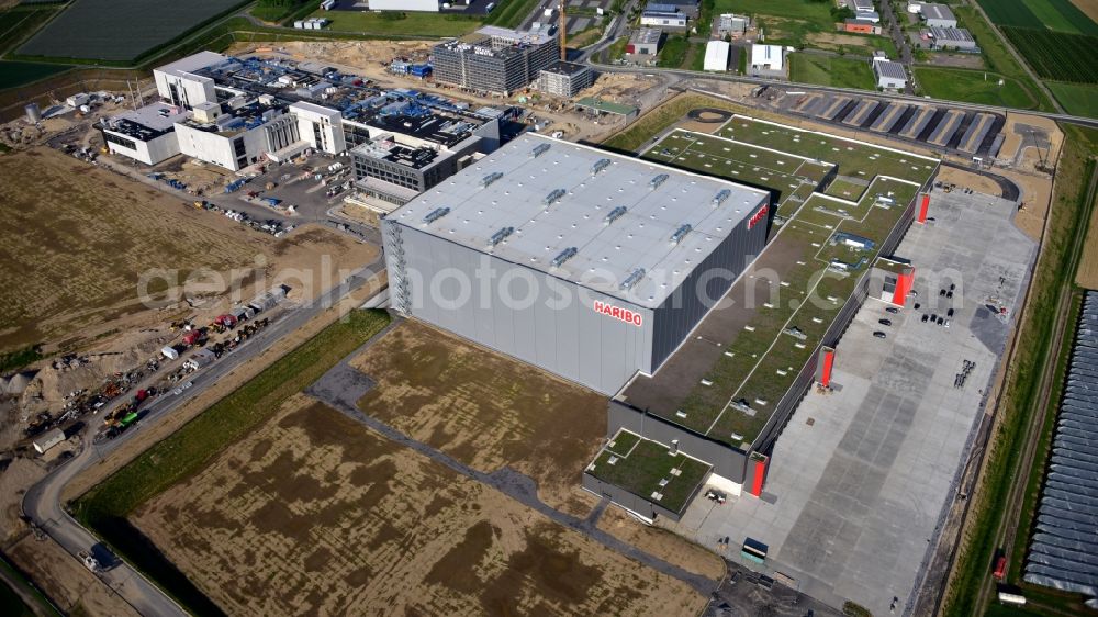 Grafschaft from above - Extension - new building - construction site on the factory premises of Haribo GmbH in Grafschaft in the state Rhineland-Palatinate, Germany