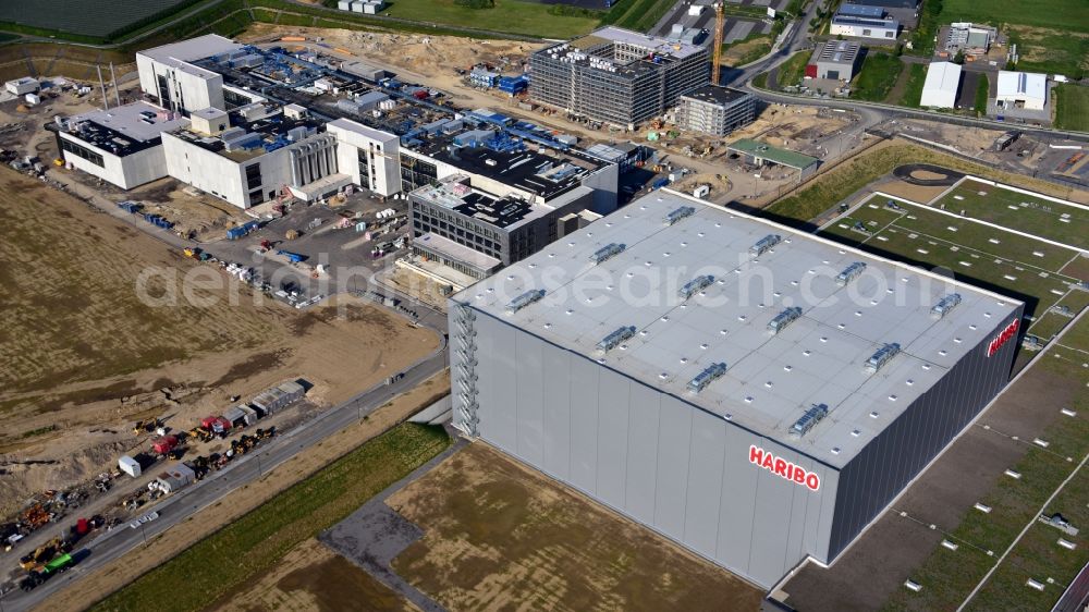 Grafschaft from the bird's eye view: Extension - new building - construction site on the factory premises of Haribo GmbH in Grafschaft in the state Rhineland-Palatinate, Germany