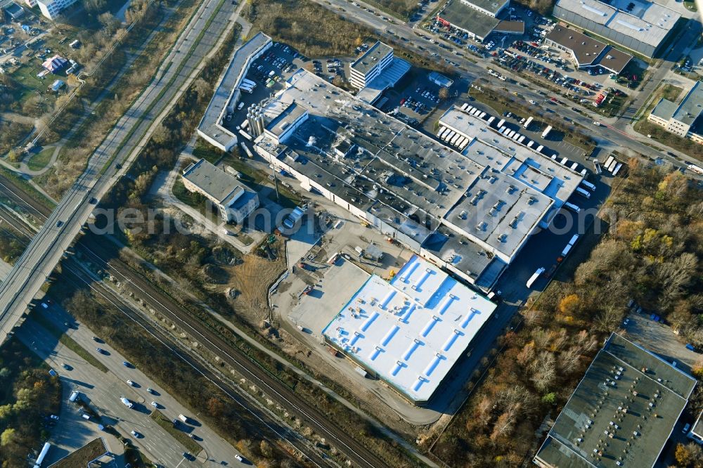 Berlin from the bird's eye view: Extension - new building - construction site on the factory premises of Harry-Brot GmbH on Wolfener Strasse in the district Marzahn in Berlin, Germany